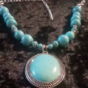 Turquoise Beaded Pendant Necklace with Silver Accents .